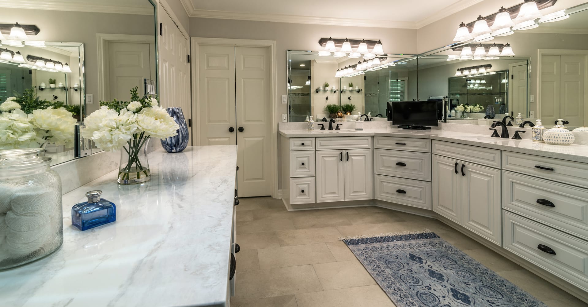 Bathroom Remodeling - White Doors, Ceiling Lamps and Lightings, Granite Countertop, White Cabinets and More.